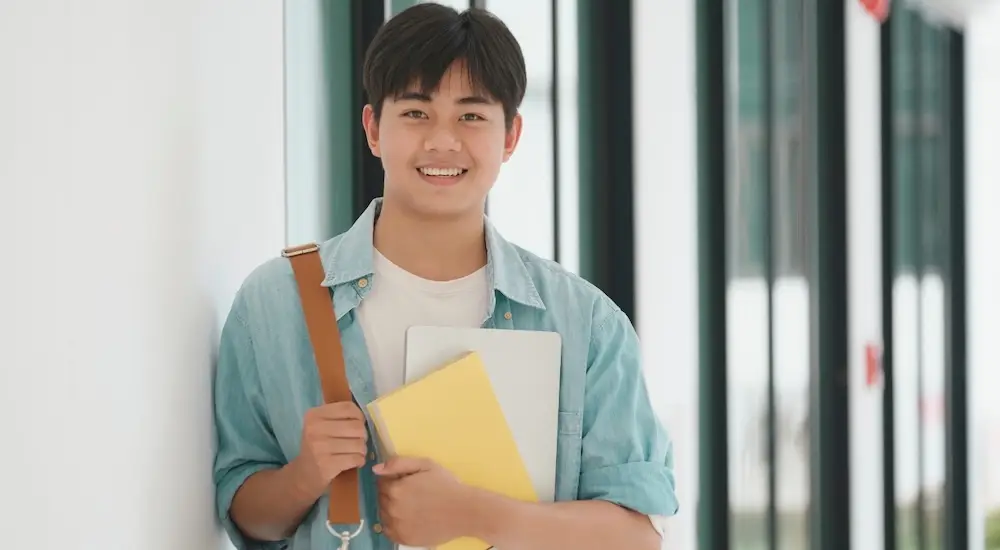 A Massachusetts college student smiles with joy now that he has received support for dealing with anxiety.